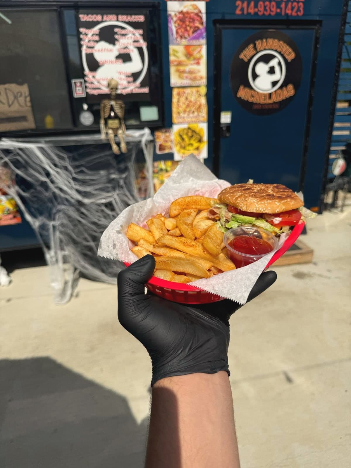 Burger and fries in a red basket